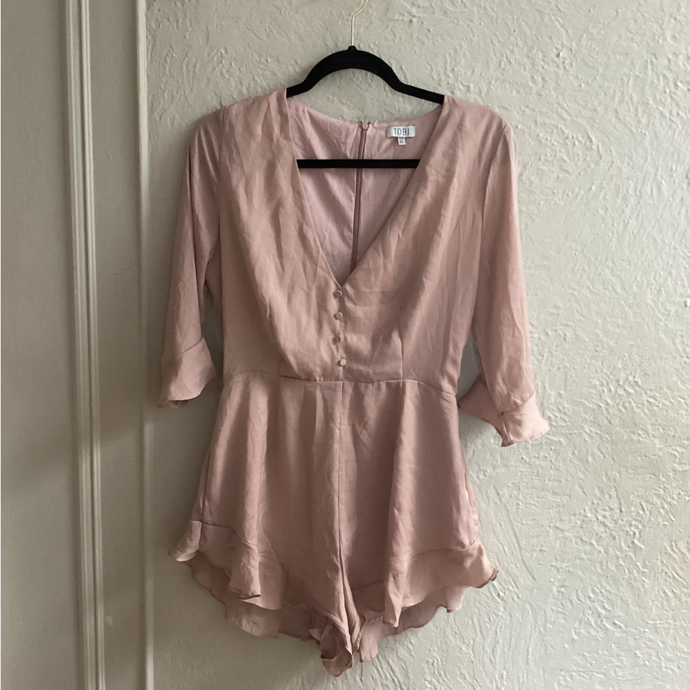 Pink long sleeve romper with tags
